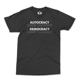 Protest T-Shirt featuring "Autocracy Takes Consent, Democracy Takes Courage" slogan in bold text.