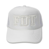 White trucker hat with "FDT" embroidered on the front.