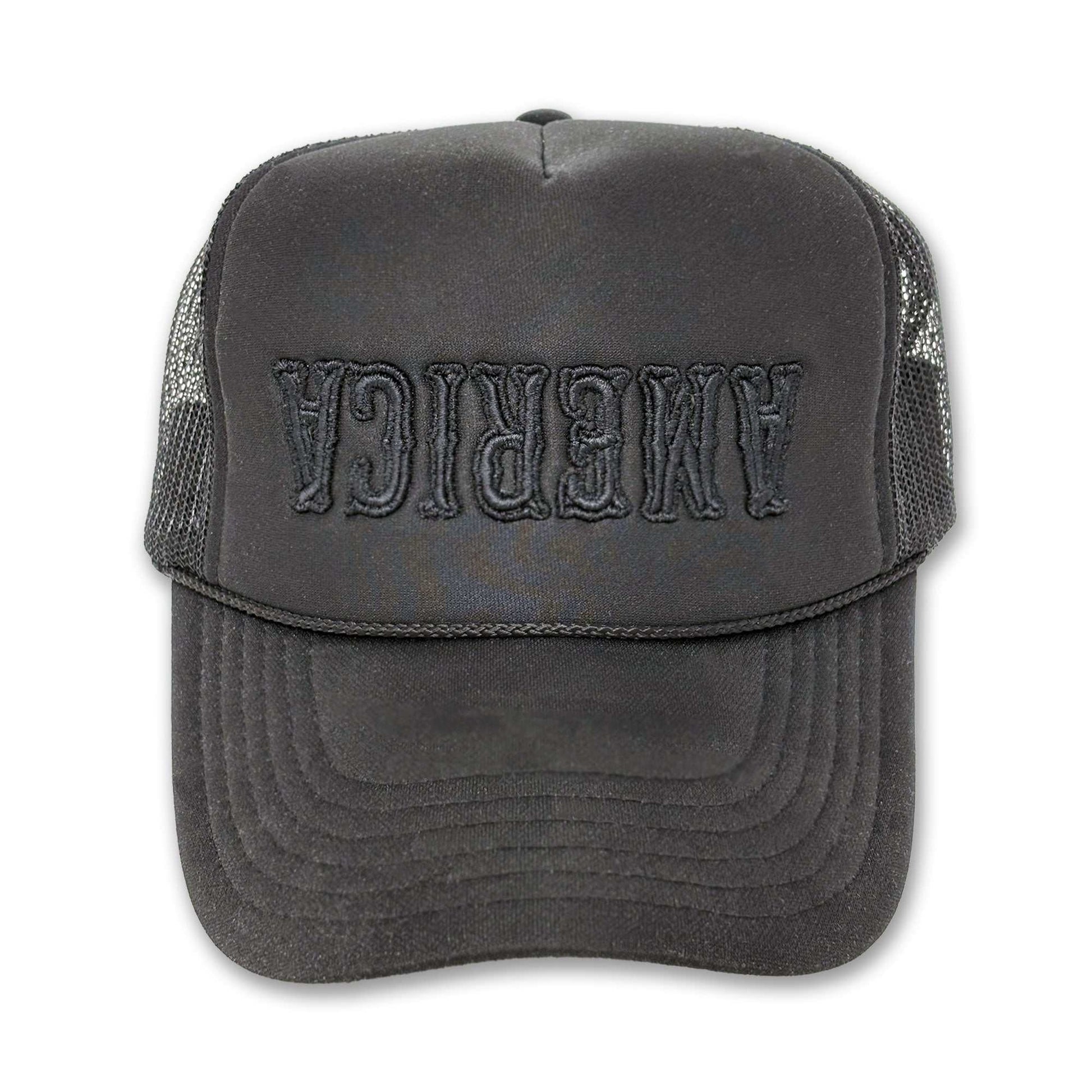 Black trucker hat with "America" embroidered upside-down.